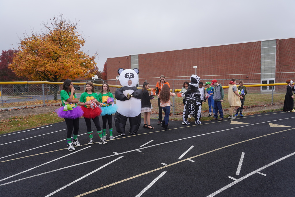 Ms. Gierucki's class lined up on the track to pass out candy