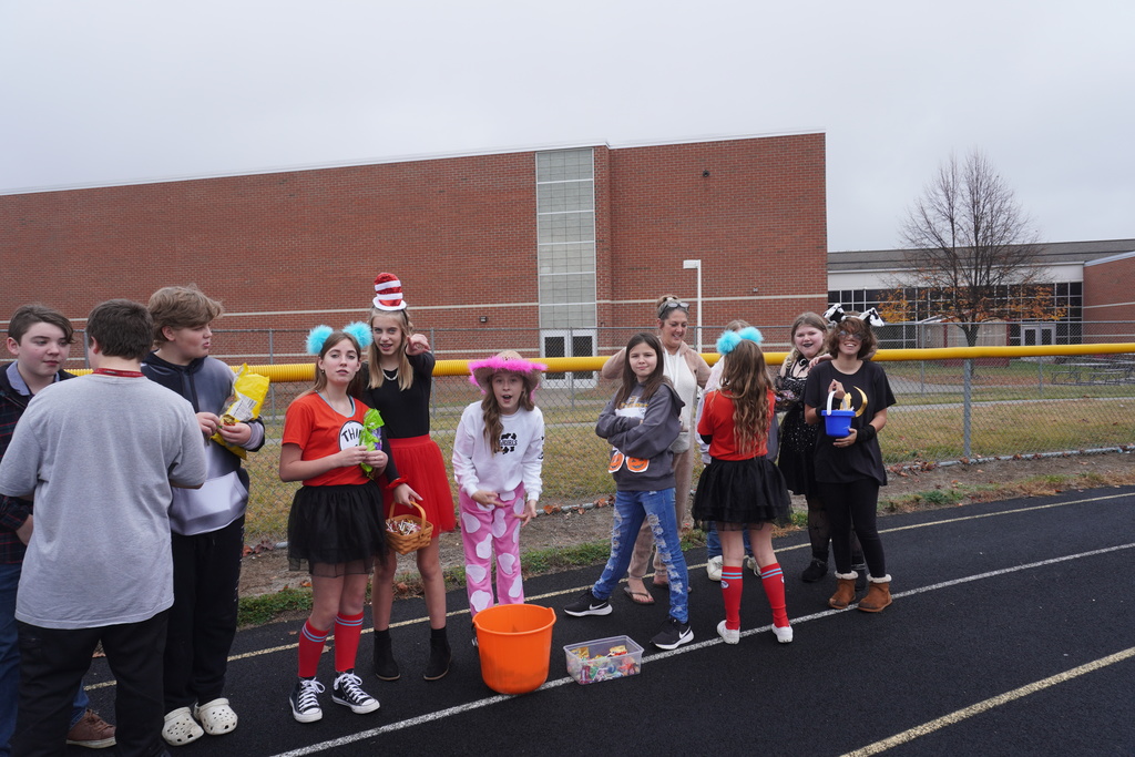 Mrs. Grondin's class lined up on the track to pass out candy