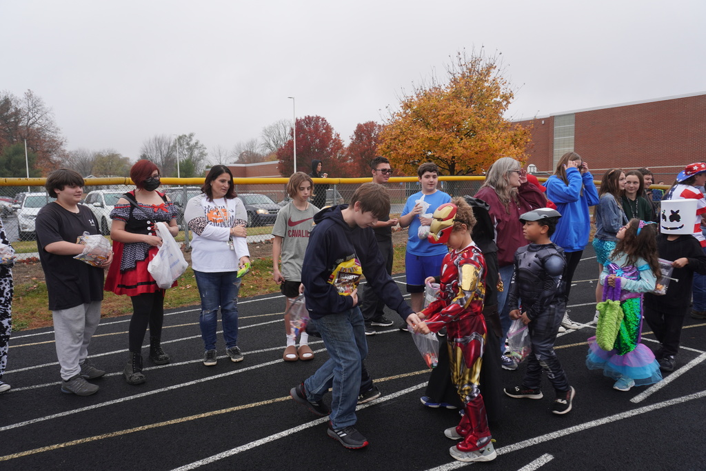 Mrs. Burrow's class hands out candy to our elementary students